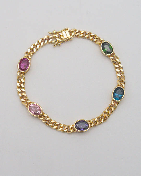 Goldenes Panzerarmband mit bunten Steinen