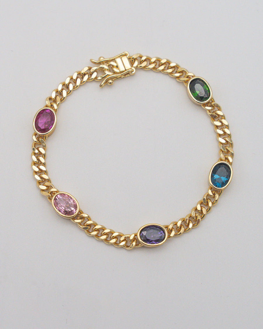 Goldenes Panzerarmband mit bunten Steinen