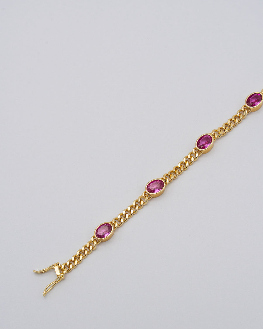 Goldenes Panzerarmband mit pinken Steinen — Detail
