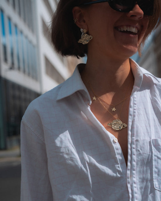 Saturn Necklace Gold worn layered with the Saturn earrings