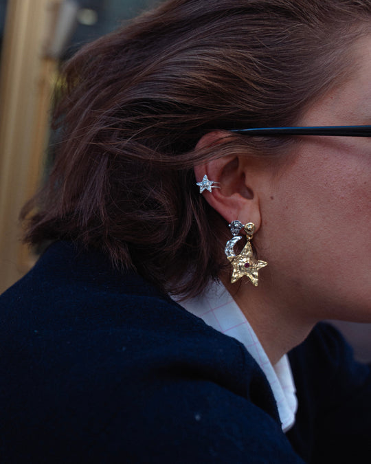 Star Earring Gold Pink — worn, close-up with ear cuff