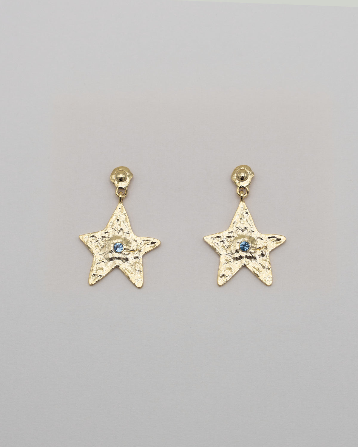 Star Earring Gold Blue — Worn