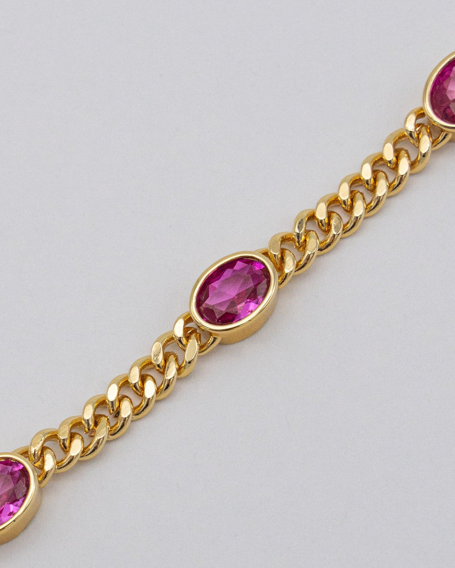 Goldenes Panzerarmband mit pinken Steinen — Detail